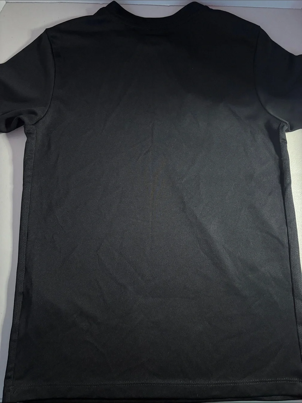Nike Dri-Fit Black Short-Sleeve Athletic Tee with White Swoosh